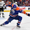 Edmonton Oilers Corey Perry bats puck goal