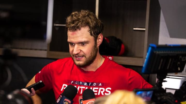 Aleksander Barkov speaking with media
